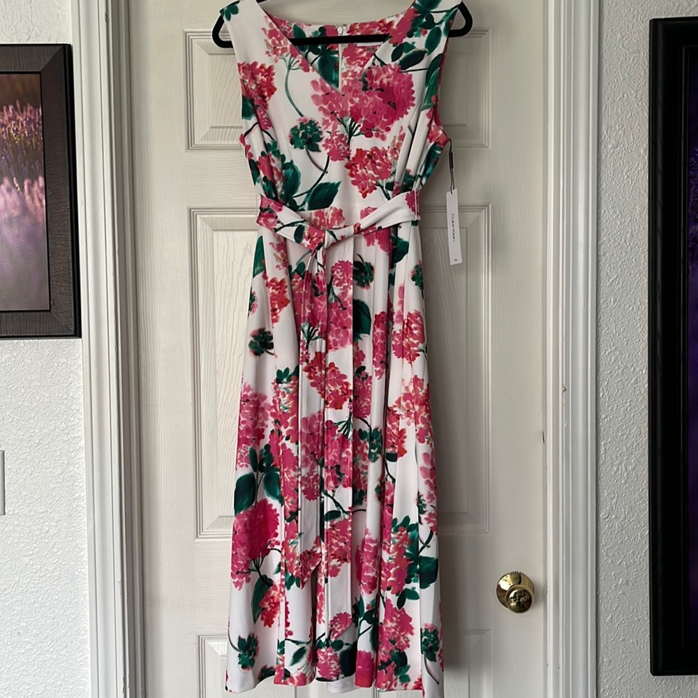 Floral Calvin Klein dress with pockets.